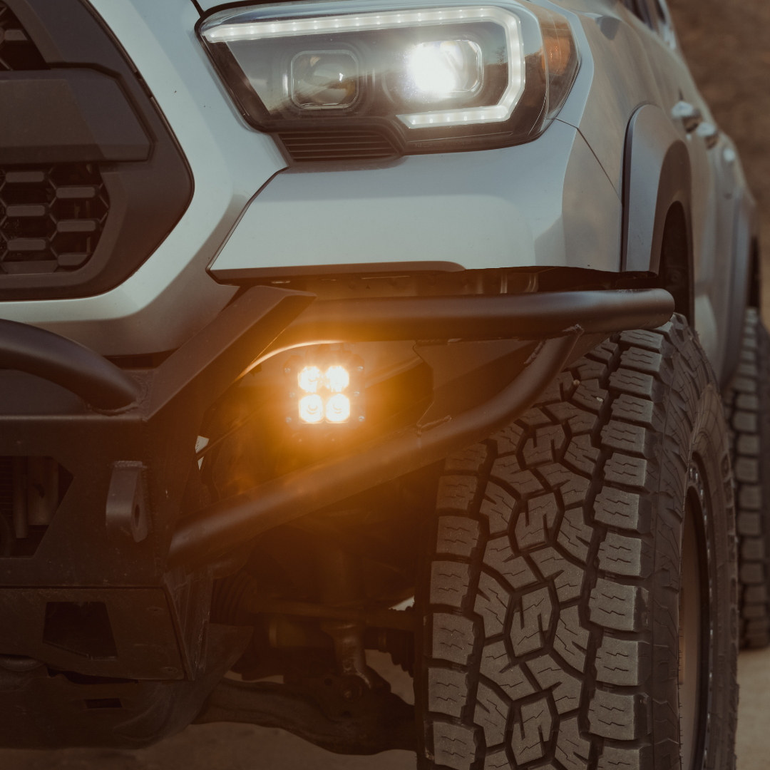 quattro led pod light mounted on a toyota tacoma as a fog light