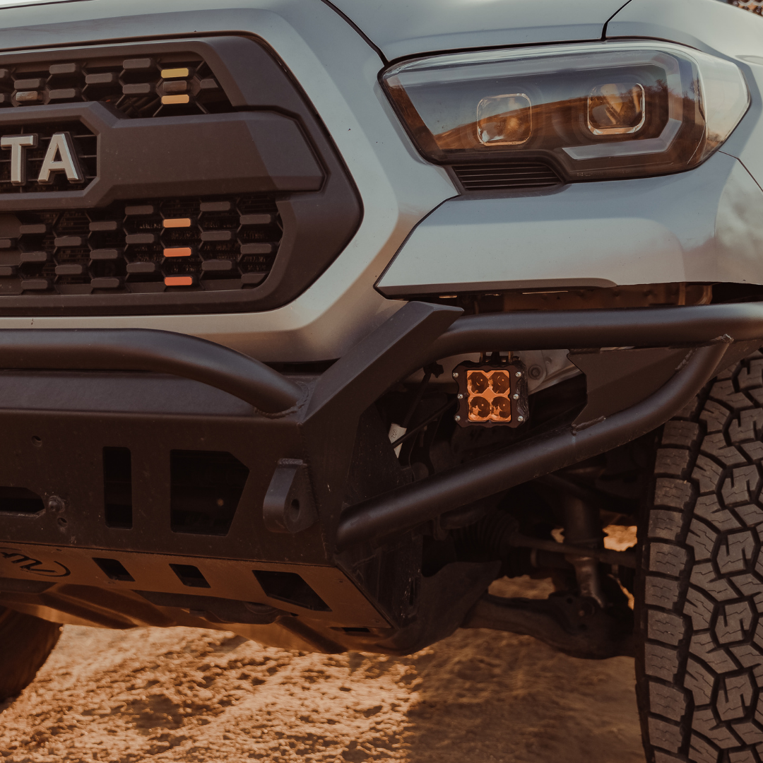 quattro led pod light mounted on a toyota tacoma as a fog light