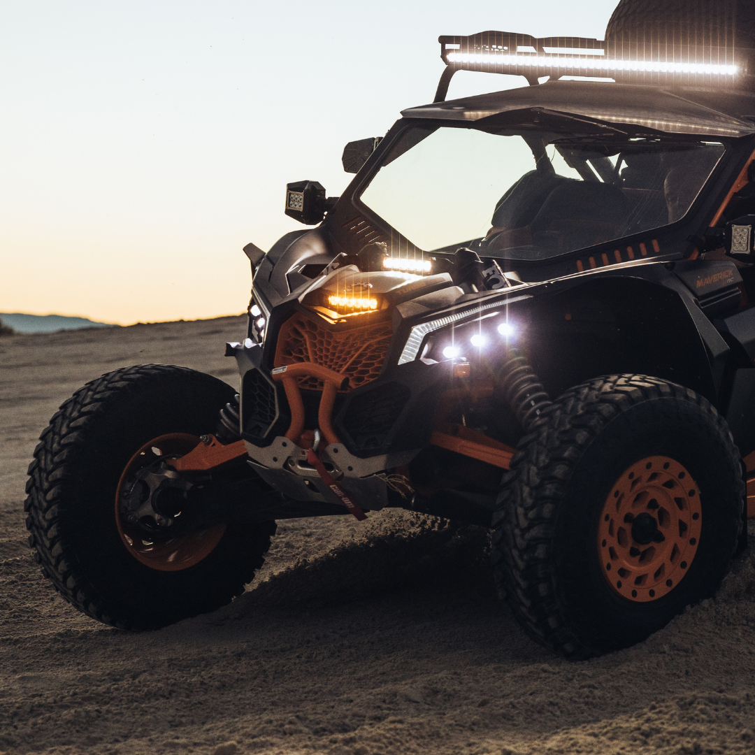 6 inch amber led light bar mounted as a shock tower light on a can-am maverick