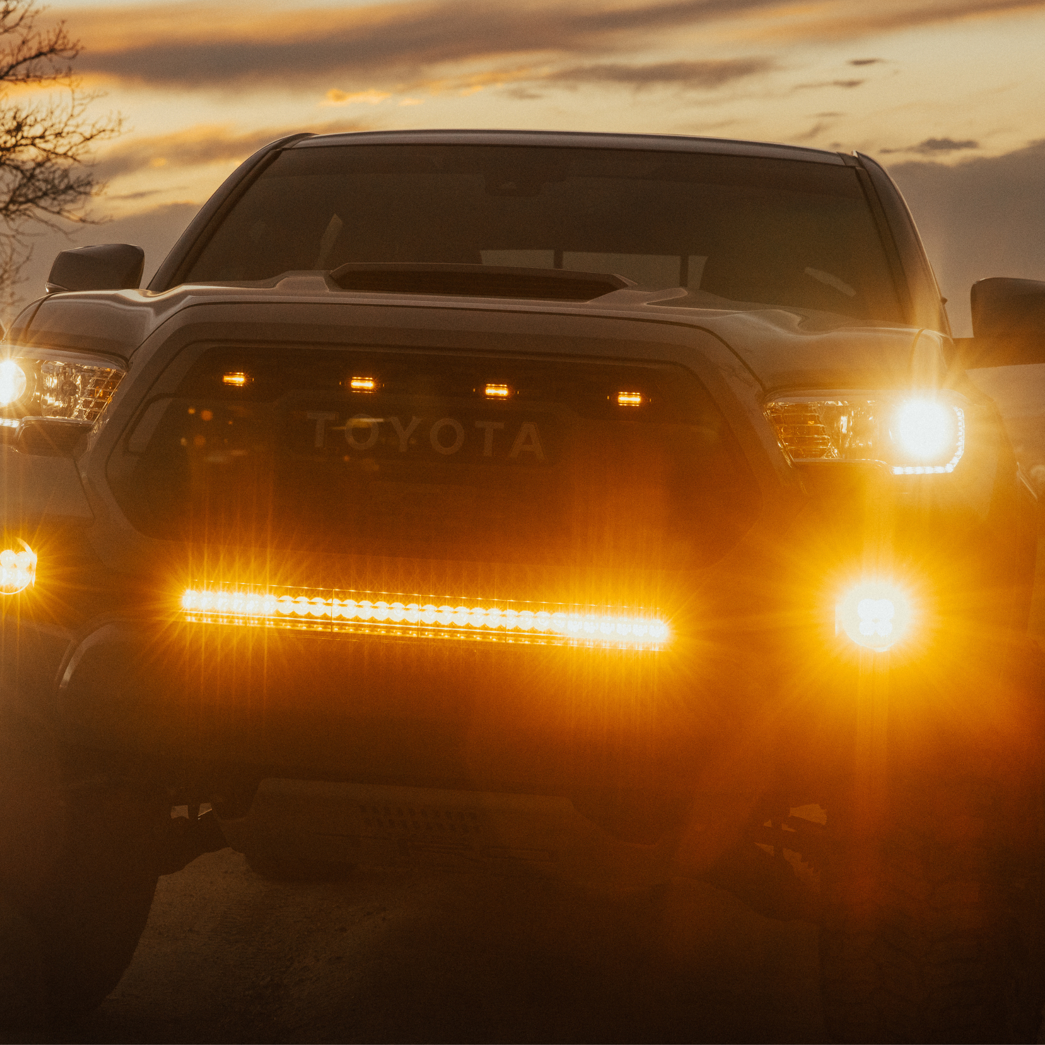 amber LED behind the grille light bar mounted on a toyota tacoma