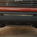 close up of a clear behind the grille light bar mounted on a toyota tundra