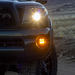 amber led fog light kit mounted on a toyota tacoma