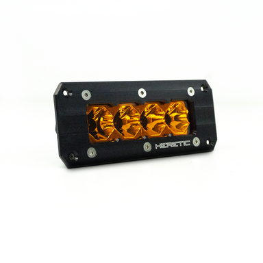 studio shot of an amber led flush mount ba-4 pod light